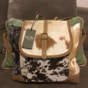 “MYRA”. Cowhide backpack all leather